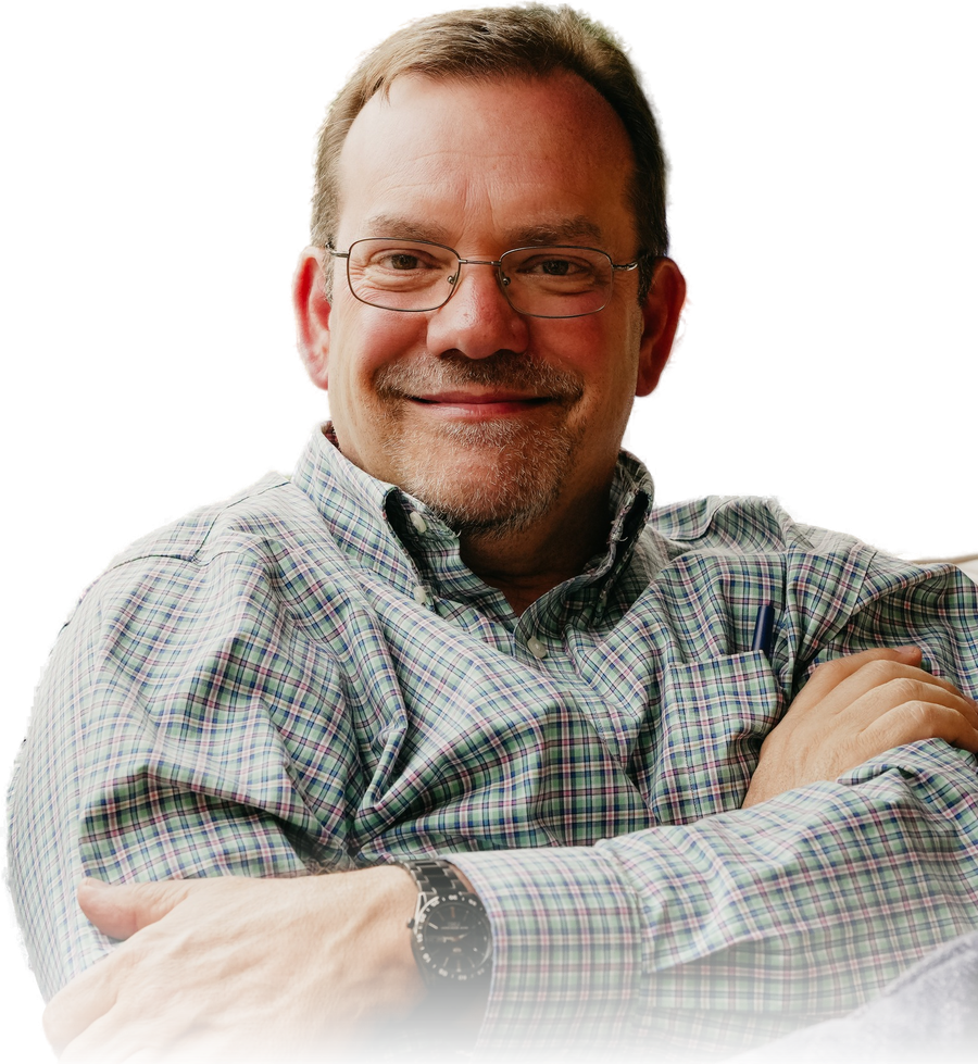 Chris Bingham, CPA, smiling with arms crossed